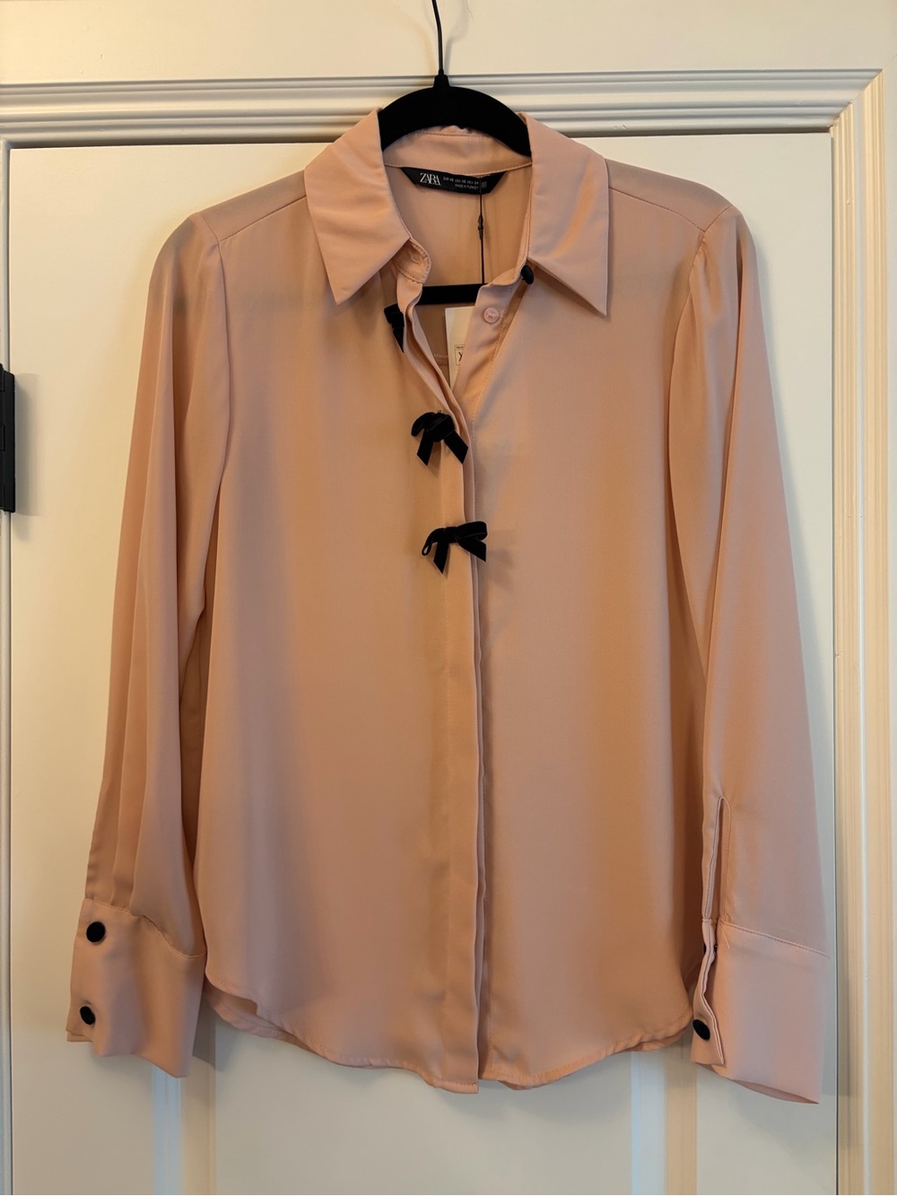 Zara Blush Pink Button-Front Blouse with Black Bow Accents